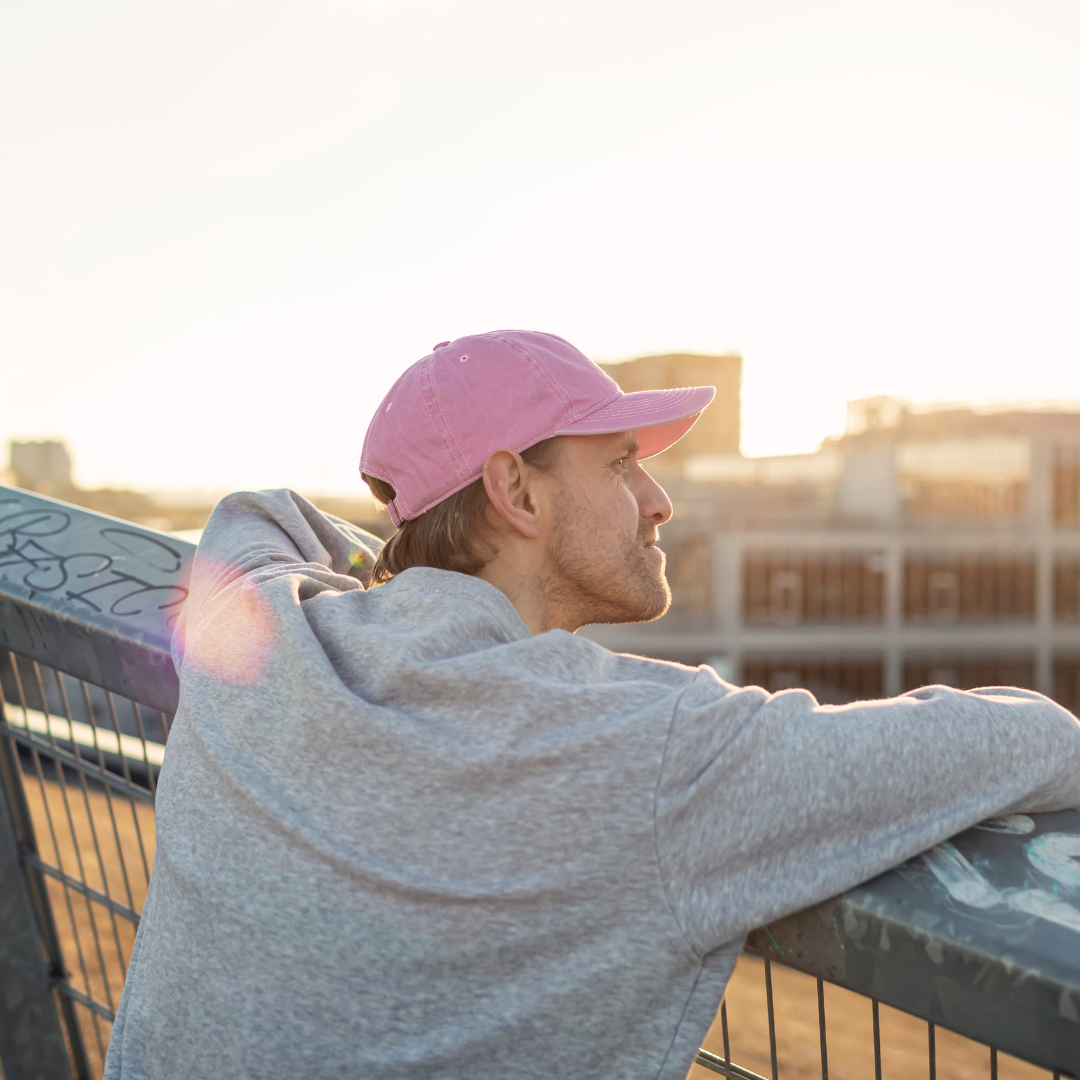 Man wearing hat in the summer sun