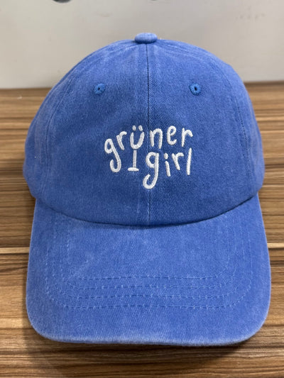 White Grüner Girl lettering on a blue Classic Cap