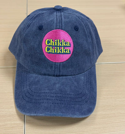 Pink and lime Chilka Chilka badge on a navy Classic Cap