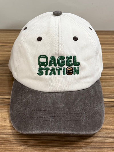 Green Bagel Station embroidery on a cream and charcoal Classic Cap