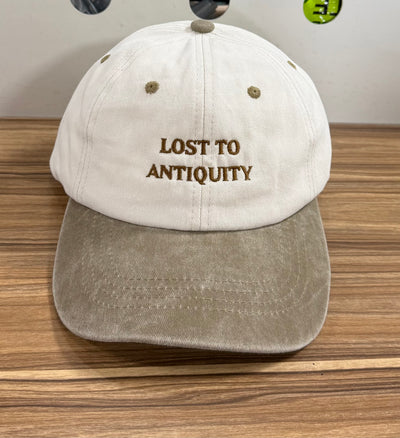 Lost to Antiquity lettering on a cream and khaki Classic Cap
