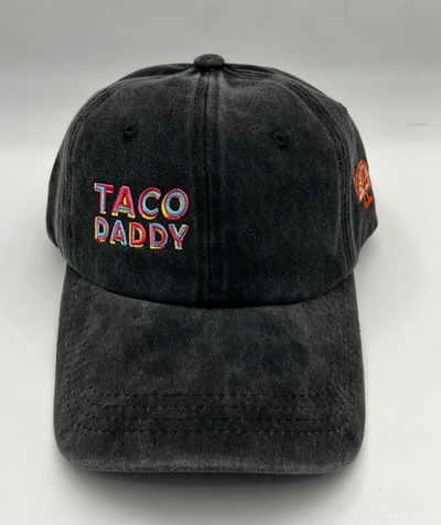 Multicolor Taco Daddy lettering on a black Classic Cap